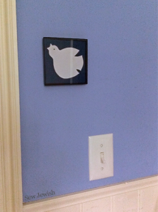 framed dove applique on wall