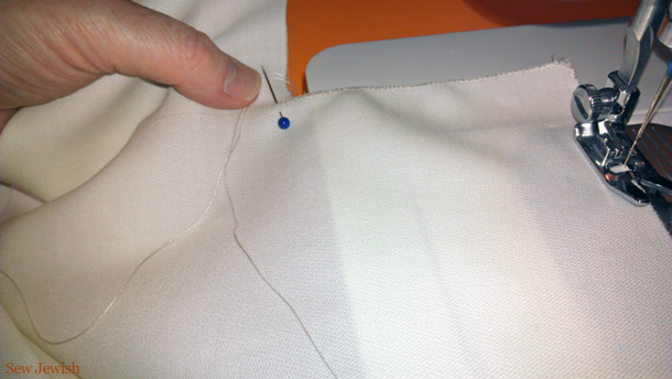 Use sewing machine zigzag stitches to finish tallit edge
